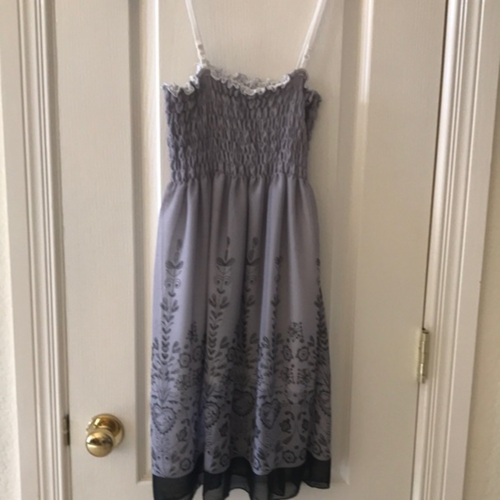 New summer Grey black dress with smocking and floral motifs on hemline